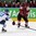 MINSK, BELARUS - MAY 10: Latvia's Martins Cipulis #47 lets a shot go while Finland's Jyri Marttinen #28 defends during preliminary round action at the 2014 IIHF Ice Hockey World Championship. (Photo by Andre Ringuette/HHOF-IIHF Images)

